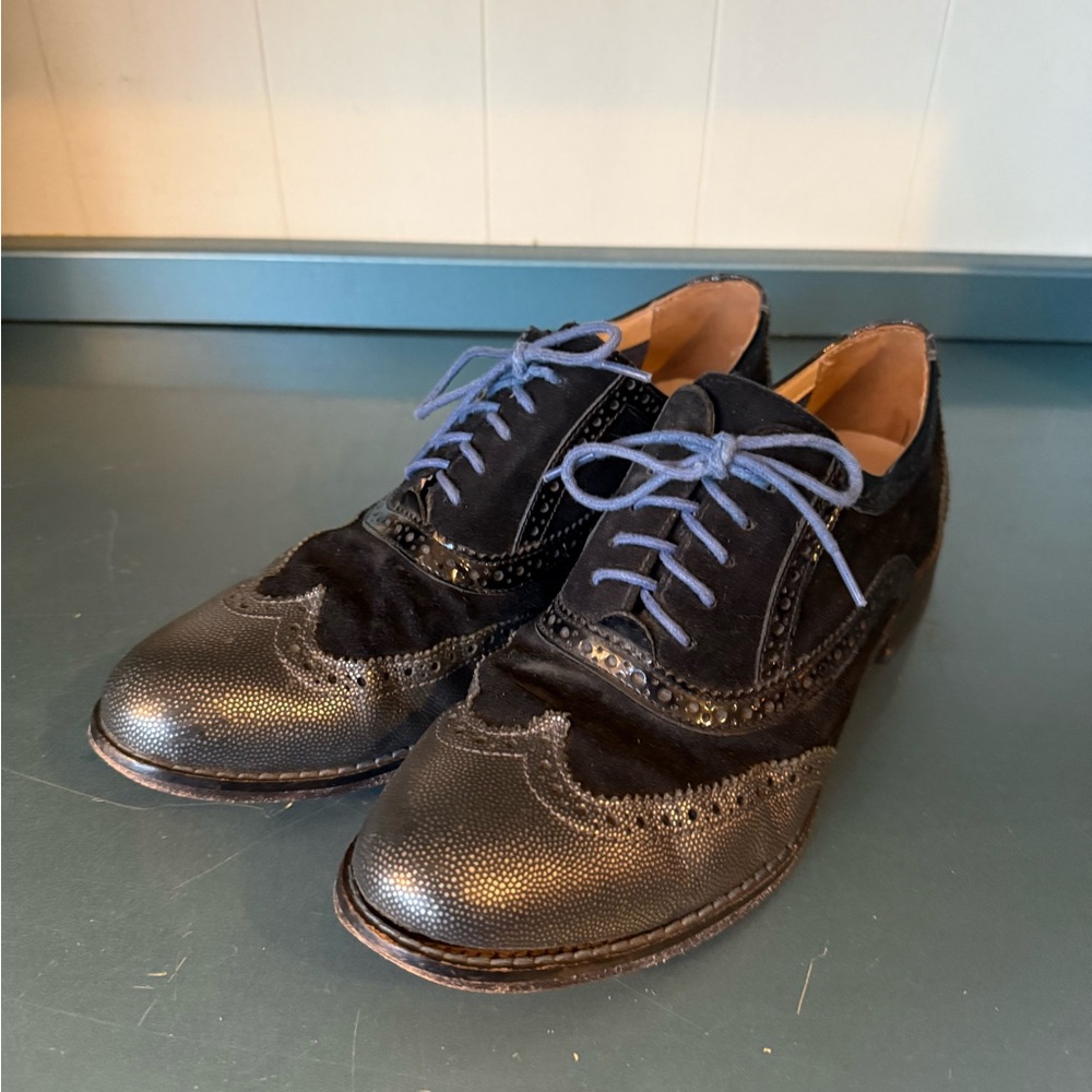 Cole Haan Black and Metallic Wingtip Oxfords with blue laces